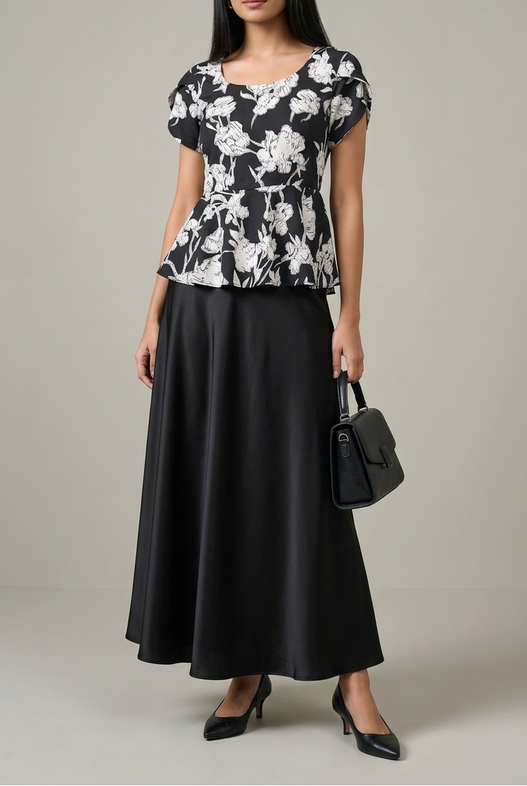 Printed floral top with black silk skirt